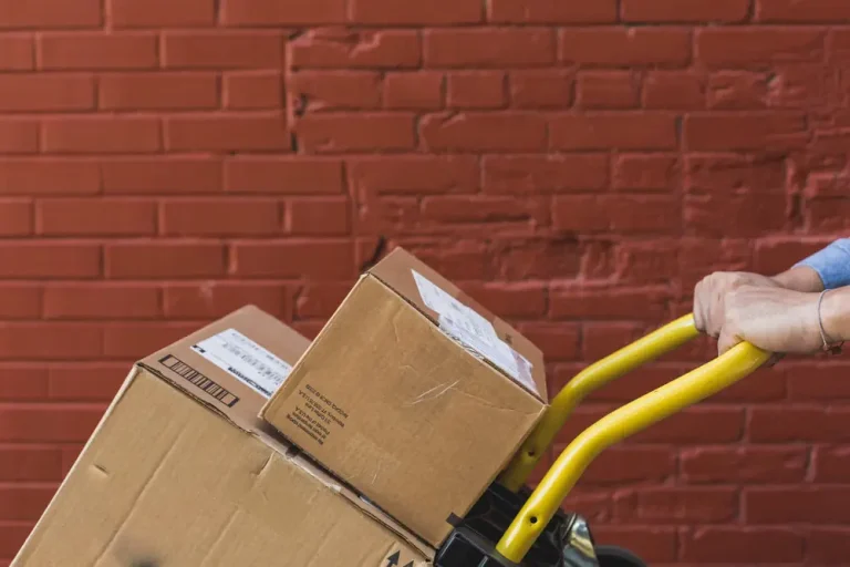 Boxes on a trolley ready for courier pickup