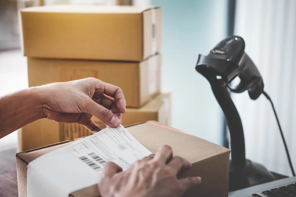 Shipping label applied to a parcel
