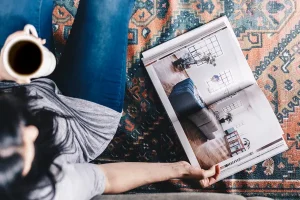 Reader with a subscriber magazine
